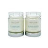 A picture of two cotton wick candles.